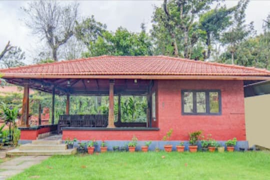 Charming ground cottage exterior with cozy verandas